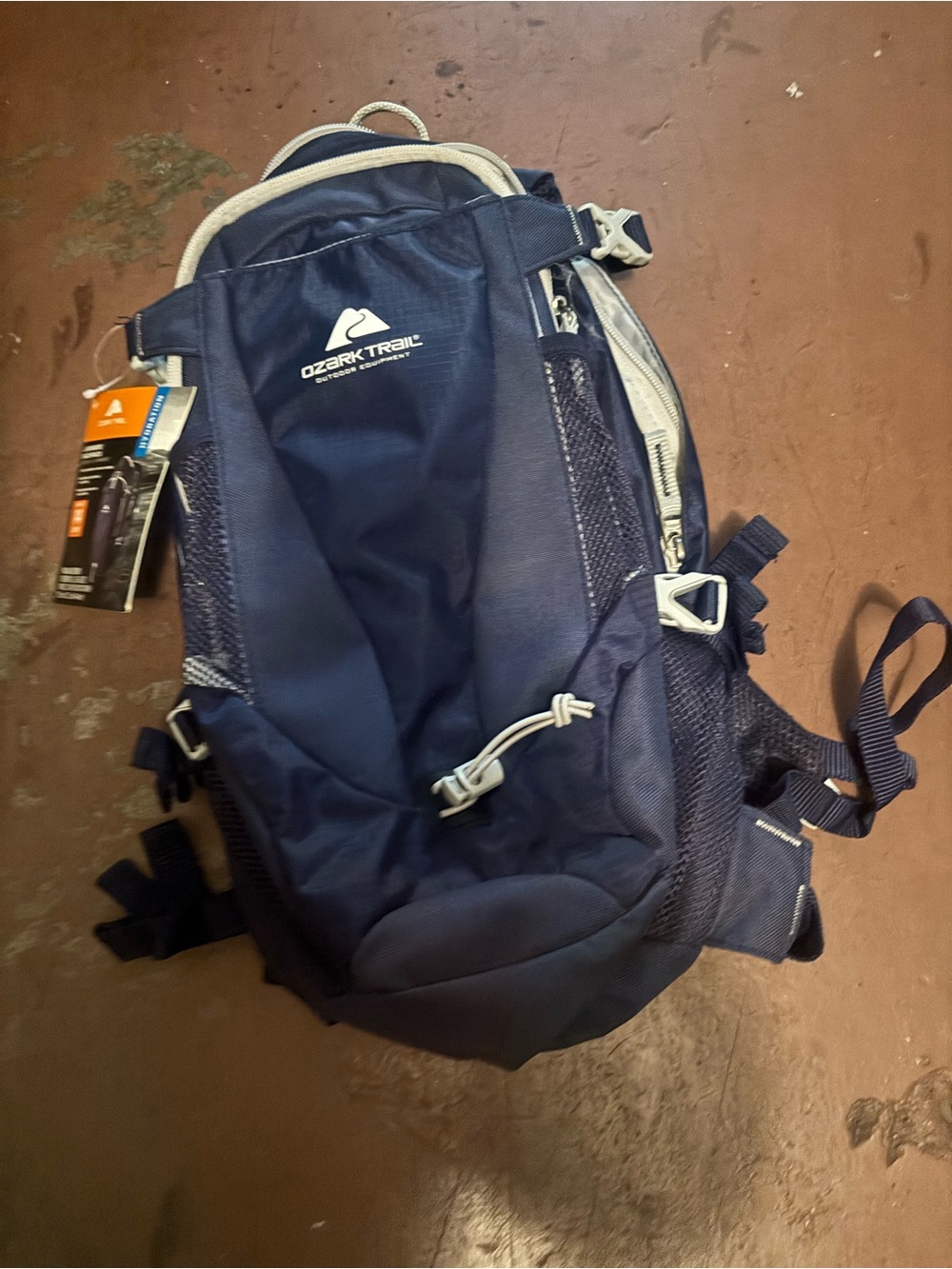 Ozark Trail Navy and Light Gray Men's Hiking Backpack with water bladder.